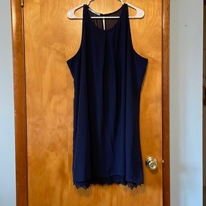 Cute and breezy, navy flare dress with lace detail